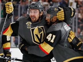 Vegas Golden Knights' William Carrier and Pierre-Edouard Bellemare (AP Photo/John Locher)