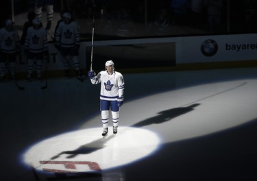 Toronto Maple Leafs center Patrick Marleau raises his stick to the crowd as he is honored before an NHL hockey game against the San Jose Sharks, his former team, Monday, Oct. 30, 2017, in San Jose, Calif. (AP Photo/Marcio Jose Sanchez) ORG XMIT: SJA102