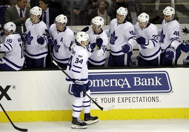 Toronto Maple Leafs' Auston Matthews (34) celebrates his goal with teammates during the first period of an NHL hockey game against the San Jose Sharks Monday, Oct. 30, 2017, in San Jose, Calif. (AP Photo/Marcio Jose Sanchez) ORG XMIT: SJA108