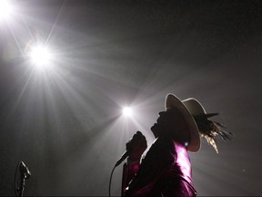 The Tragically Hip's Gord Downie, performs during the first stop of the Man Machine Poem Tour at the Save-On-Foods Memorial Centre in Victoria, B.C., Friday, July 22, 2016. Jim Cuddy shared the stage with fellow Canadian music star Gord Downie several times over their long careers, but it was a performance last February that was perhaps the most poignant. THE CANADIAN PRESS/Chad Hipolito ORG XMIT: CPT503