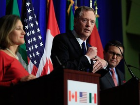United States Trade Representative Robert Lighthizer, centre, with Canadian Minister of Foreign Affairs Chrystia Freeland, left, and Mexico's Secretary of Economy Ildefonso Guajardo Villarrea, right, speaks during the conclusion of the fourth round of negotiations for a new North American Free Trade Agreement (NAFTA) in Washington, Tuesday, Oct. 17, 2017. (AP Photo/Manuel Balce Ceneta)