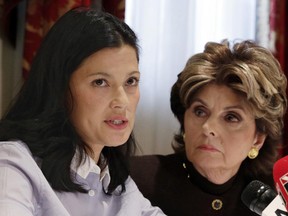 Actress Natassia Malthe (left), accompanied by attorney Gloria Allred, reads a statement during a news conference in New York, Wednesday, Oct. 25, 2017, where she alleged sexual assault by Harvey Weinstein in 2010. (Richard Drew/AP Photo)