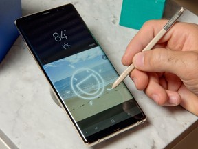This Aug. 16, 2017, file photo shows a Samsung Galaxy Note8 and accompanying stylus on display in New York. (AP Photo/Richard Drew, File)