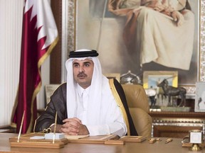 In this Friday, July21, 2017, file photo, Emir of Qatar Sheikh Tamim bin Hamad Al Thani talks in his first televised speech since the dispute between Qatar and three Gulf countries and Egypt, in Doha, Qatar.