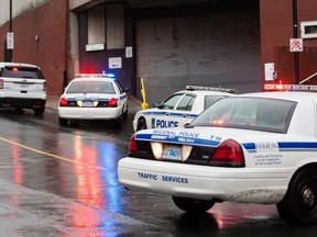 In this file photo, Halifax Regional Police cars block traffic on Thursday Oct. 23, 2014.