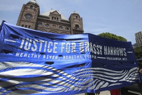 Hundreds march at Queen’s Park on behalf of Grassy Narrows First Nation requesting the clean up of the Wabigoon River after a paper mill dumped toxic waste into the river, June 2, 2016.