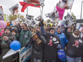 Daycare workers demonstrate during their one-day province wide strike Monday, October 30, 2017 in Montreal.