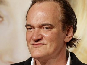 Director Quentin Tarantino says he knew about a few instances of improper conduct by producer Harvey Weinstein and wishes he had done more. (Laurent Cipriani/AP Photo/Files)