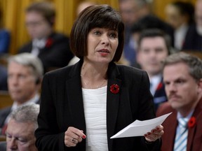 Health Minister Ginette Petitpas Taylor responds to a question during Question Period in the House of Commons, in Ottawa on Tuesday, October 31, 2017. THE CANADIAN PRESS/Adrian Wyld