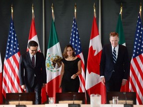 Minister of Foreign Affairs Chrystia Freeland meets for a trilateral meeting with Mexico's Secretary of Economy Ildefonso Guajardo Villarreal, left, and Ambassador Robert E. Lighthizer, United States Trade Representative, during the final day of the third round of NAFTA negotiations at Global Affairs Canada in Ottawa on Wednesday, Sept. 27, 2017. THE CANADIAN PRESS/Sean Kilpatrick