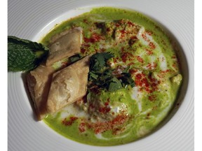 Dahi Bhalla appetizer (lentil dumpling with yogurt and tamarind sauce), from Saffron Indian Cuisine Restaurant, located at 469 Parsons Road SW. (Photo by Larry Wong/Postmedia) For August 27, 2016 restaurant review
Larry Wong, Postmedia