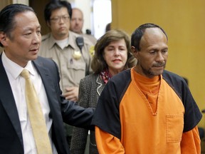 In this July 7, 2015 file photo, Jose Ines Garcia Zarate, right, is led into a San Francisco courtroom. (Michael Macor/San Francisco Chronicle via AP, Pool, File)