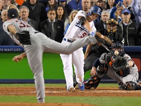 Los Angeles Dodgers' Corey Seager hits a sacrifice fly off Houston Astros starting pitcher Justin Verlander during the sixth inning of Game 6 of baseball's World Series Tuesday, Oct. 31, 2017, in Los Angeles. (AP Photo/Mark J. Terrill)