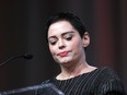 Actress Rose McGowan speaks at the inaugural Women's Convention in Detroit, Friday, Oct. 27, 2017. McGowan recently went public with her allegation that film company co-founder Harvey Weinstein raped her. (AP Photo/Paul Sancya)