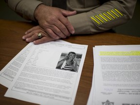 In this Thursday, Nov. 10, 2016 photo, Redding Sheriff Tom Bosenko shares case details regarding the missing persons case for Sherri Papini, 34, of Mountain Gate, in Redding, Calif.