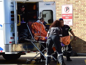 Toronto, CAN., 20 Oct 2017 - The first of four patients arrive at Sunnybrook Trauma Centre. Four teens were rushed to hospital, all with serious stab wounds, after a late afternoon stabbing outside David & Mary Collegiate Institute, on Lawrence Avenue at Brimley Road, in Scarborough Friday afternoon.