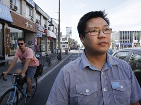 Matt Lee laments the lack of foot traffic and customers to his store ever since the bike lane was installed on Bloor Street West in Toronto,  on Tuesday September 26, 2017.
