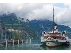 Beautifully restored century-old paddle steamers cross Switzerland's Lake Lucerne to connect with the mountain-climbing Gotthard Panorama Express.