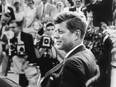 This handout photo provided by the Newseum, and the estate of Jacques Lowe, shows John F. Kennedy at a news conference in Omaha, Neb. in 1959.