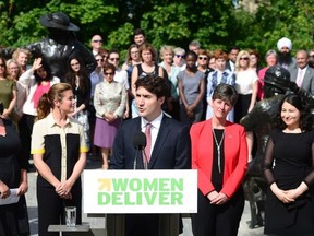 Prime Minister Justin Trudeau addresses a Women Deliver event as Sophie Gregoire Trudeau and Status of Women Minister Maryam Monsef look on in Ottawa on Tuesday, June 13, 2017.