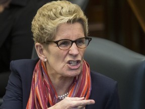 Premier Kathleen Wynne defends her government in the legislature regarding the Ontario auditor general special report on the Fair Hydro Plan on Oct. 17, 2017.