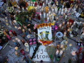 A makeshift memorial for the victims of Sunday night's mass shooting stands at an intersection on the north end of the Las Vegas Strip, October 3, 2017 in Las Vegas, Nevada. The gunman, identified as Stephen Paddock, 64, of Mesquite, Nevada, allegedly opened fire from a room on the 32nd floor of the Mandalay Bay Resort and Casino on the music festival, leaving at least 58 people dead and over 500 injured. According to reports, Paddock killed himself at the scene. The massacre is one of the deadliest mass shooting events in U.S. history. (Photo by Drew Angerer/Getty Images)