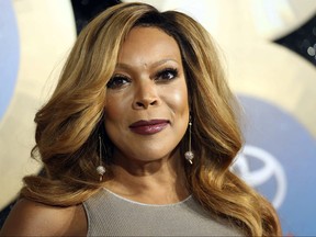 In this Nov. 7, 2014, file photo, TV talk show host Wendy Williams arrives during the 2014 Soul Train Awards in Las Vegas. Williams gave viewers a scare Tuesday morning when she passed out on-the-air during a broadcast of her syndicated chat show. as introducing a segment while wearing a Statue of Liberty Halloween costume when her speech suddenly became slurred. She began shaking and seconds later collapsed on the stage. Stagehands rushed in to help her while the crowd screamed.