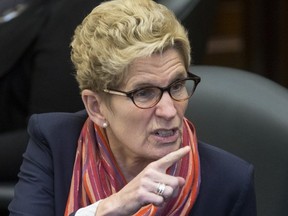 Premier Kathleen Wynne defends her government in the Legislature regarding the Ontario Auditors General special report on the Fair Hydro Plan in Toronto, Ont. on Tuesday, Oct. 17, 2017. The anti-Tory Working Families Coalition kicked in $2.5 million that was spent on ads to help Wynne get elected in 2014.