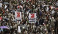 In this  Sept. 12, 2014  photo, Houthi Shiite protest after fellow protesters were killed in  clashes with Yemeni police, during a funeral procession in Sanaa, Yemen. Yemen's 2011 Arab Spring revolt began with a nucleus of young men and women, a mix of socialists, secularists and moderate Islamists seeking to end autocrat Ali Abdullah Saleh's 33-year rule and transform the poorest Arab nation into a democratic, modern society.  That dream never materialized as the country is now plagued by war.