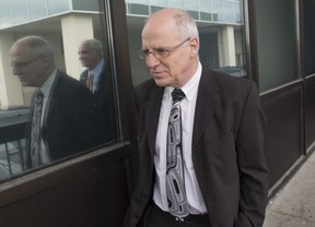 Ben Levin enters court for the first day of his sentencing in Toronto, April 13, 2015. (Tyler Anderson/Postmedia Network)