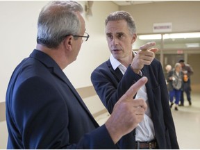 Randy Hiller, Progressive Conservative MPP for Lanark-Frontenac-Lennox and Addington, left, speaks with Dr. Jordan Peterson, a University of Toronto professor, before a talk to a group of people at the Carleton Place Arena Thursday, June 15, 2017.