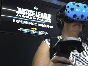 The Toronto Sun's Jane Stevenson transformed into a virtual reality Wonder Woman at the IMAX VR Centre located at Scotiabank Theatre on Richmond St.