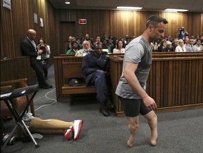 Oscar Pistorius demonstrates his difficult getting around at his 2014 murder trial. Prosecutors say the judge put too much emphasis on the former Olympians disability.