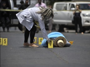 A Mexican journalist lies dead on the street, the victim of the nations drug wars. A box containing two heads was dropped off at a local TV station in Guadalajara.