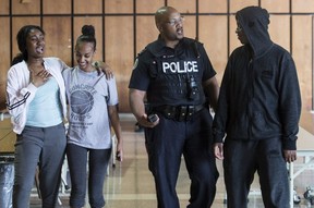 Const. Alphonso Carter, a school resource officer at Blessed Cardinal Newman, one of the schools in the Toronto Catholic District School 
Board system.