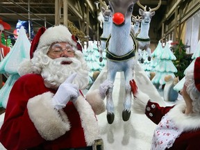 Santa Claus checks in on the progress of the planning of the 113th Santa Claus Parade.
