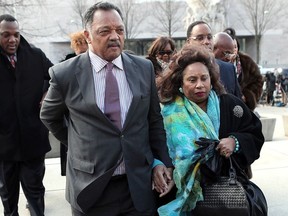 Rev. Jesse Jackson (L) and his wife Jacqueline Lavinia Brown (R) arrive at U.S. District Court for a hearing involving his son, former Rep. Jesse Jackson Jr., February 20, 2013 in Washington, DC.