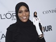 Ibtihaj Muhammad holds a Barbie doll in her likeness at the 2017 Glamour Women of the Year Awards at Kings Theatre on Monday, Nov. 13, 2017, in New York.
