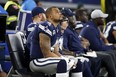 Dallas Cowboys quarterback Dak Prescott sits on the bench late in Thursday's game against the Los Angeles Chargers. (AP PHOTO)