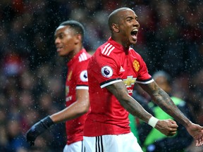 Manchester United's Ashley Young celebrates scoring against Brighton Hove Albion on Saturday. (GETTY IMAGES)