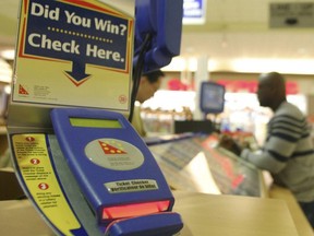 OLG ticket machine that lets players automatically check to see if they possess a winning or losing lottery ticket.