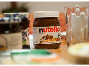 A picture taken on January 8, 2014 shows a pot of Italian hazelnut and cocoa spread "Nutella" on a breakfast table in Inzell, Germany. The maker of the chocolate and hazelnut spread Nutella acknowledged on November 6, 2017 adjusting its formula following a report by a German consumer group. / AFP PHOTO / dpa / Tobias Hase / Germany OUTTOBIAS HASE/AFP/Getty Images