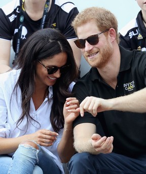 Prince Harry (R) and Meghan Markle (L) attend a wheelchair Tennis match during the Invictus Games 2017 at Nathan Philips Square on Sept. 25, 2017, in Toronto, Canada. (Chris Jackson/Getty Images for the Invictus Games Foundation)