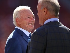 Dallas Cowboys owner Jerry Jones, left, stands on the field prior to his team's game against the San Francisco 49ers at Levi's Stadium on October 22, 2017.