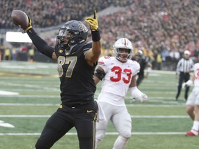Iowa tight end Noah Fant celebrates a second-quarter touchdown during yesterday’s stunning Hawkeyes upset over Ohio State in Iowa City.
Getty Images