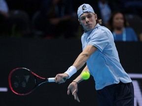 Denis Shapovalov of Canada returns a backhand in his match against Andrey Rublev of Russia during Day 3 of the Next Gen ATP Finals on November 9, 2017 in Milan, Italy.  (Photo by Emilio Andreoli/Getty Images)