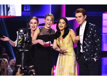 Madelaine Petsch, Lili Reinhart, Camila Mendes, and KJ Apa speak onstage during the 2017 American Music Awards at Microsoft Theater on Nov. 19, 2017 in Los Angeles.  (Photo by Kevin Winter/Getty Images)