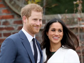 LONDON, ENGLAND - NOVEMBER 27: Prince Harry and actress Meghan Markle during an official photocall to announce their engagement at The Sunken Gardens at Kensington Palace on November 27, 2017 in London, England. Prince Harry and Meghan Markle have been a couple officially since November 2016 and are due to marry in Spring 2018. (Photo by Chris Jackson/Chris Jackson/Getty Images)