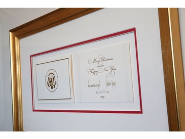 The 2017 official White House Christmas card is on display during a press preview of the 2017 holiday decorations November 27, 2017 in Washington, DC. (Photo by Alex Wong/Getty Images)