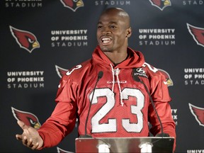 Arizona Cardinals running back Adrian Peterson speaks during a press conference in London, Wednesday, Oct. 18, 2017.